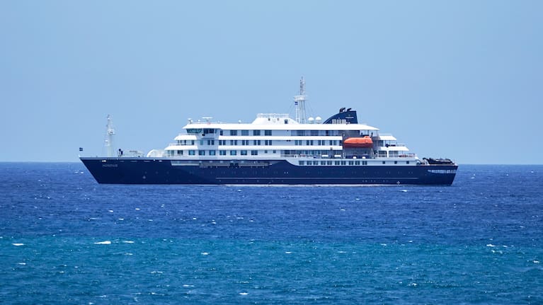 The MV Hondius cruise ship is anchored at a port in Praia, Cape Verde
