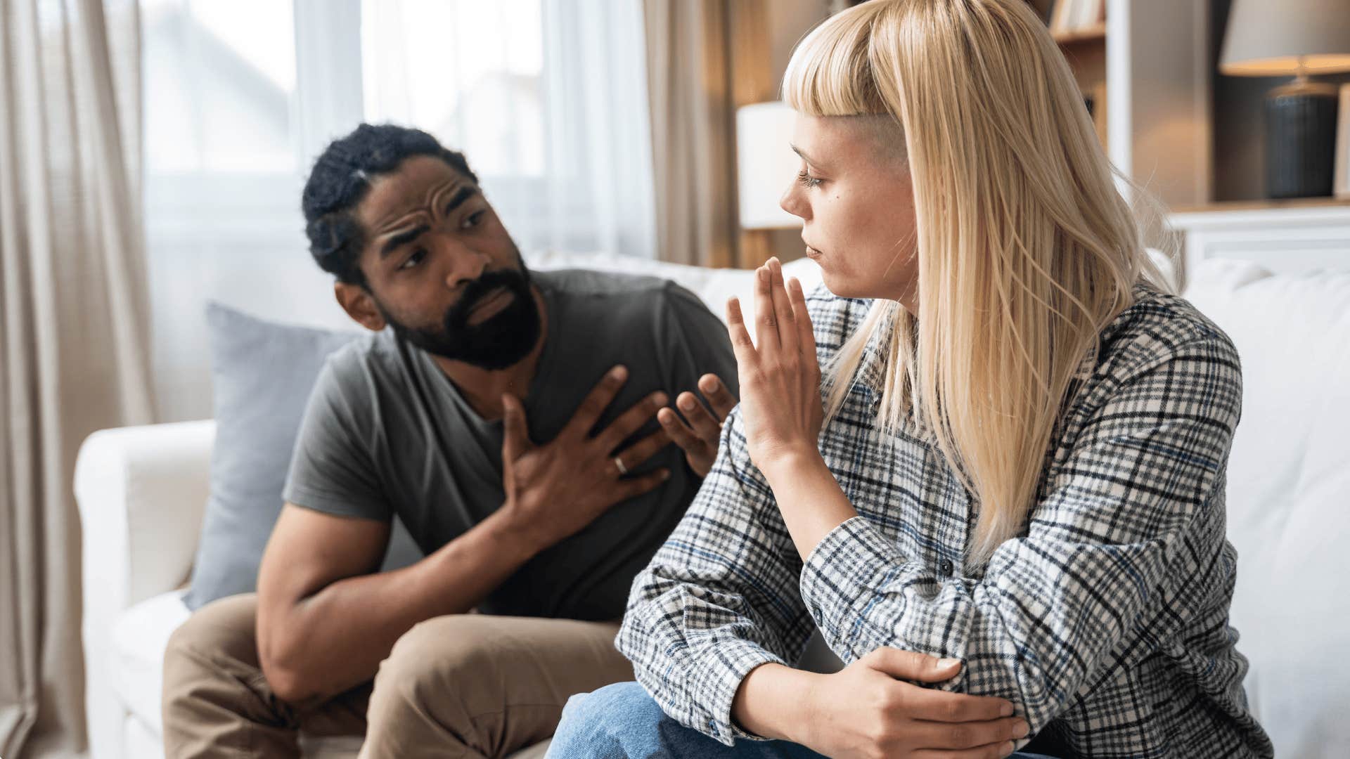 woman arguing with roommate unable to afford living alone