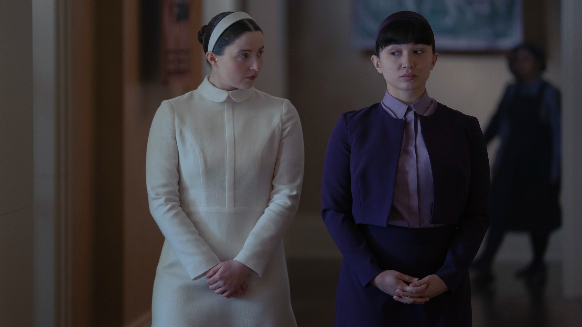 LUCY HALLIDAY, ROWAN BLANCHARD in The Testaments