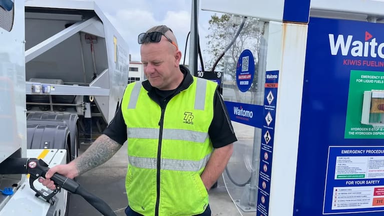 TR Group driver trainer Paul Fair fills up one of the company's hydrogen fuel cell trucks at the Hiringa refuelling station in Wiri, Auckland.