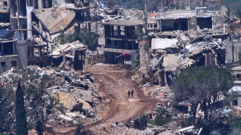 Two Israeli soldiers operate in southern Lebanon, as seen from northern Israel, Wednesday, April 29, 2026.