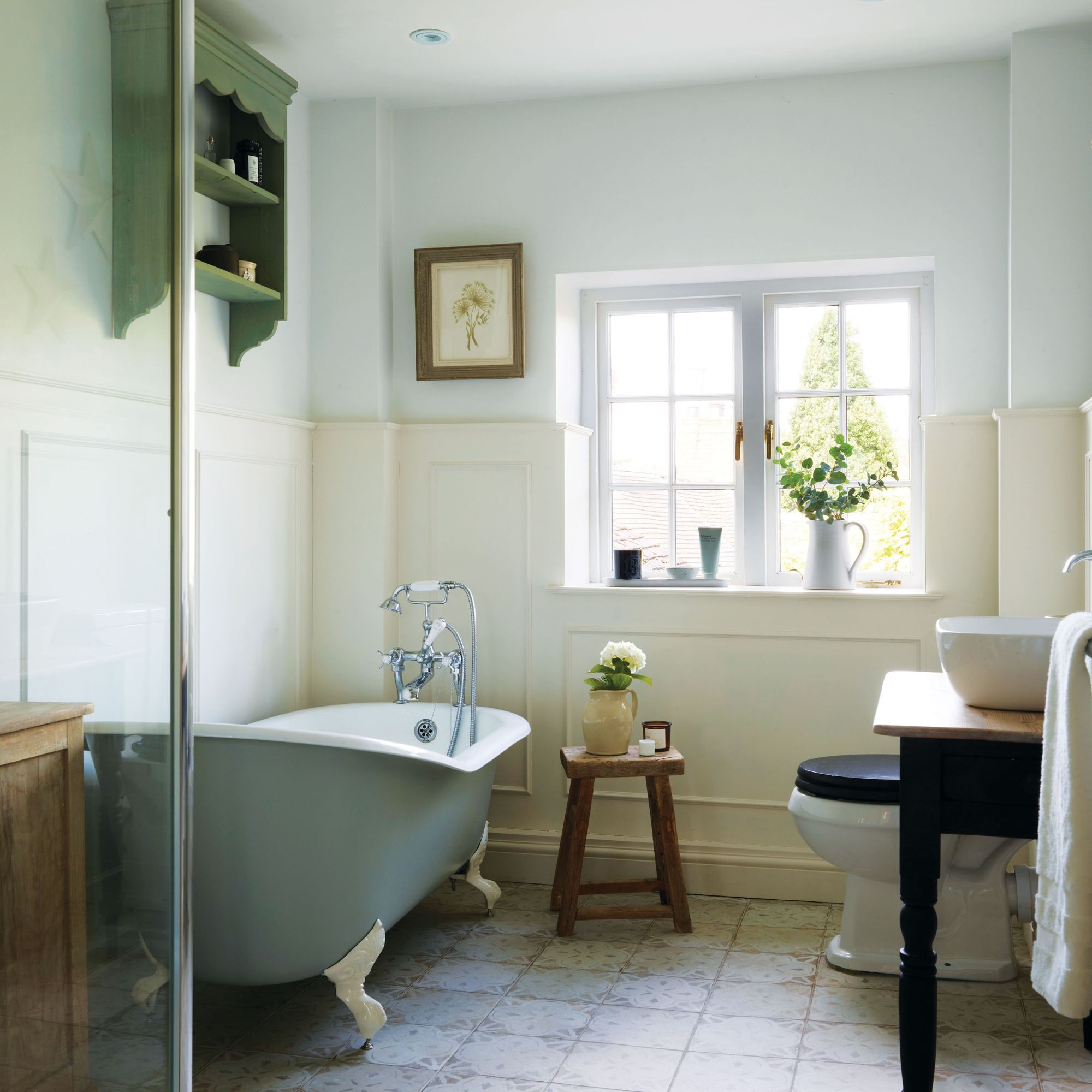 Main bathroom in keen house - beige and blue tones with freestanding tub