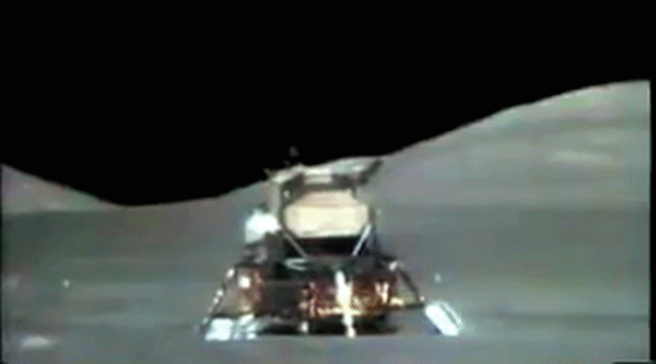 A blurry capsule launches from the surface of the moon.