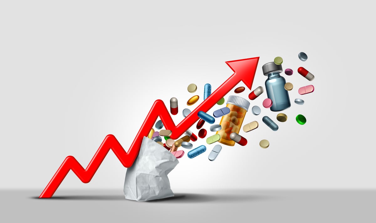 An arrow moving higher amid pills.