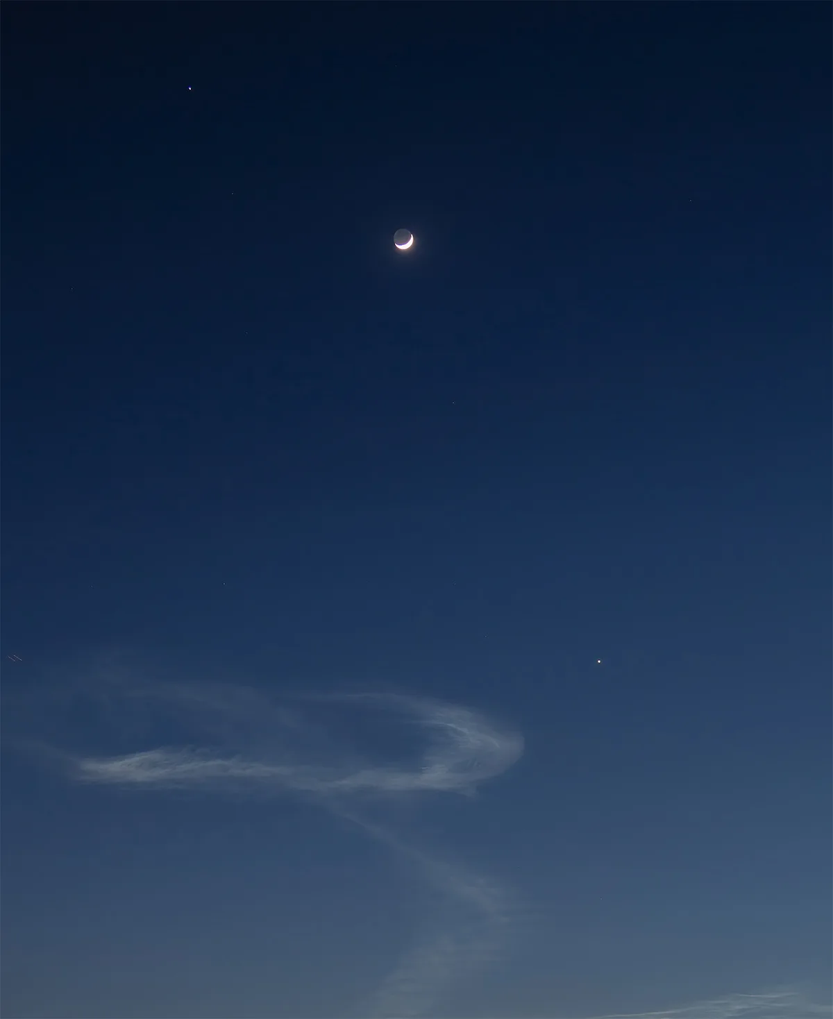 Behyar Bakhshandeh managed to capture this view of Venus, the crescent Moon and Jupiter along with a SpaceX Falcon 9 rocket tail over Carlsbad, California, USA. Behyar says: "The sunset was especially orange due to smoke from local fires in Southern California." Equipment: Canon 5D Mark III Camera, Canon EF 24-105mm f/3.5-5.6 IS Lens Exposure: ISO 400, f/4, 1.7 sec