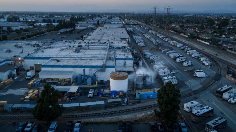 Water is sprayed on a tank that overheated at an aerospace plant in Garden Grove, California, Friday, May 22, 2026.
