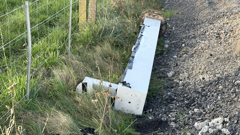 Wrecked speed camera lies in a ditch in Otago