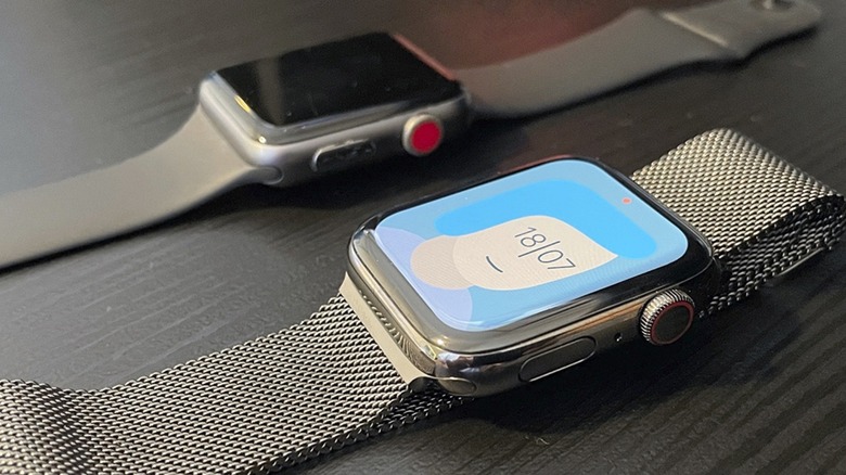 Two Apple Watch models on a desk