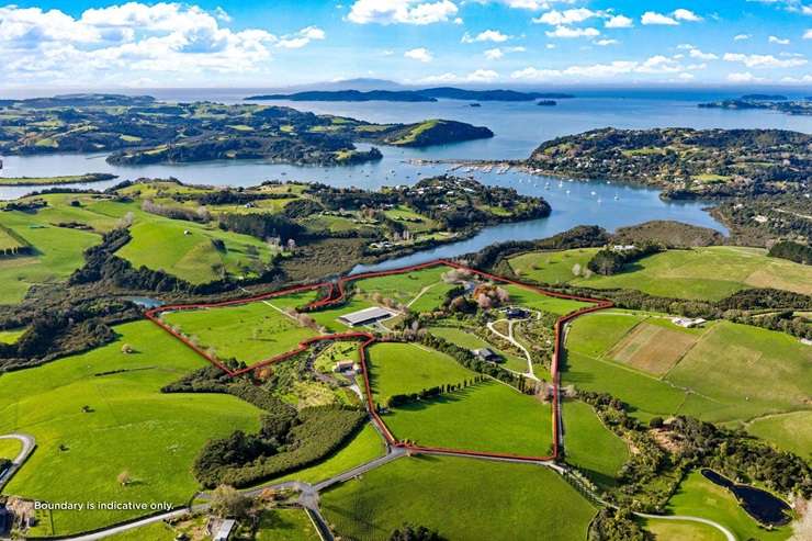 The three-bedroom rammed-earth home at 97 Sharp Road, in Matakana, is known locally as Obsidian House. Photo / Supplied