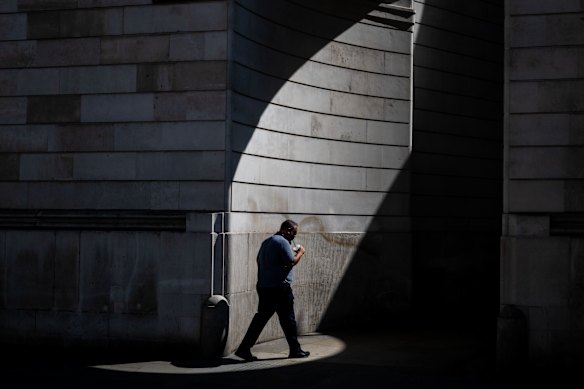 A worker in London on Wednesday, as the UK recorded its hottest June day.