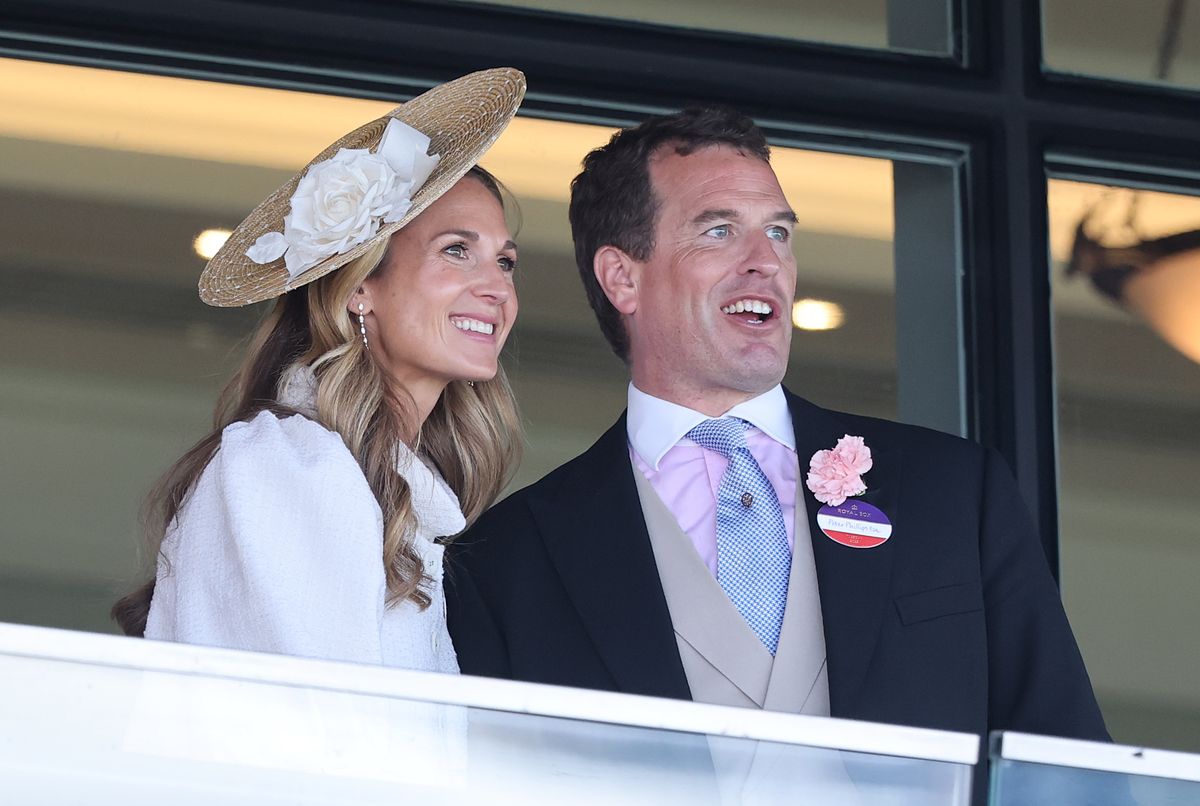 Harriet Sperling and Peter Phillips smile as they attend day one of Royal Ascot in June 2025