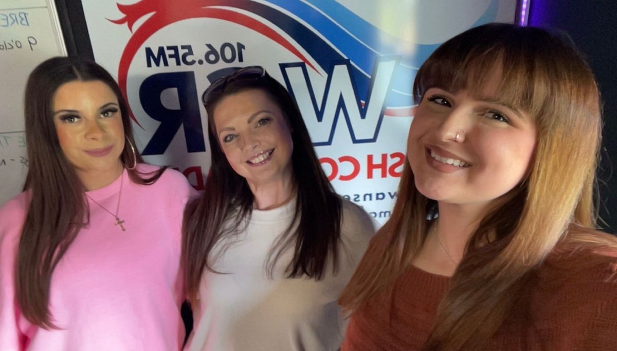 Three women pictured inside a radio station