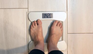A photo of a woman standing on a bathroom scale.