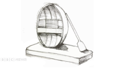 A black-and-white line drawing of a round coracle boat on its side on a plinth with a paddle leaning against its side.