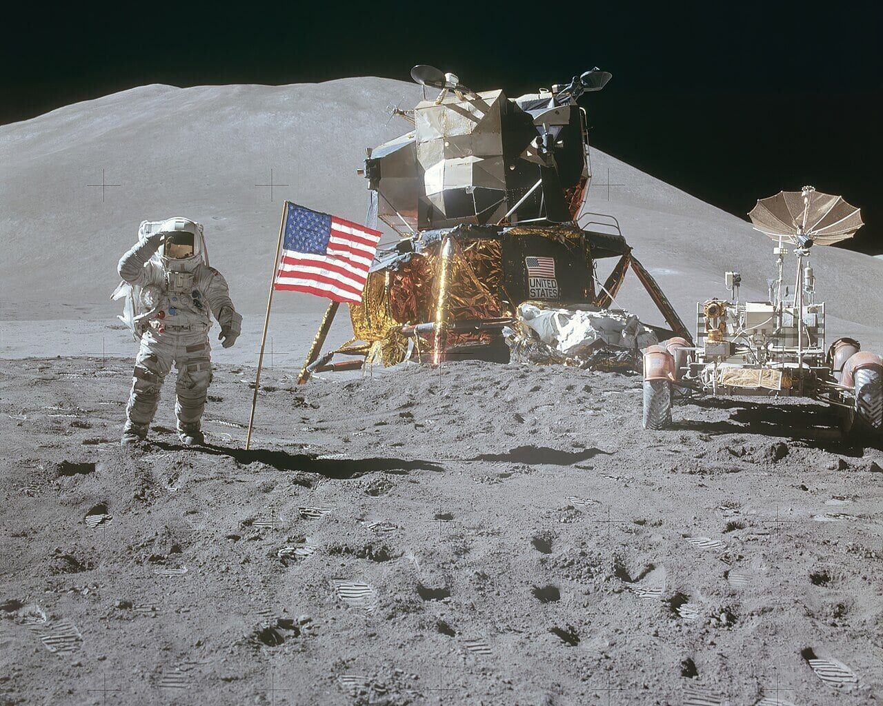 Astronaut James Irwin gives a salute beside U.S. flag during Apollo 15 mission. The rock samples from the Apollo era give only a snapshot to the composition of the lunar surface (Credit : NASA)