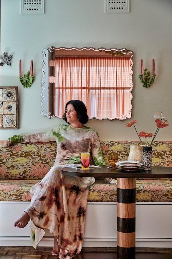 The dining area doubles as a work space with under-storage for shoes. The table’s by Dowel Jones and the ceramic birds either side of the mirror are by Alana Beveridge.