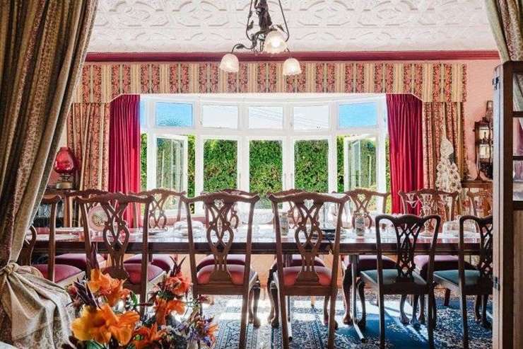 Jim Stuart and Cristine Leitch have listed their Edwardian-style home at 346 Tauwhare Road, in Matangi, Waikato. They want someone to buy their property and their vast collection of antiques. Photo / Supplied