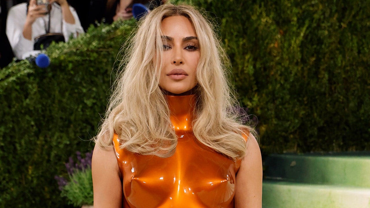 Kim Kardashian posts bikini photos, first couple pic with Lewis Hamilton