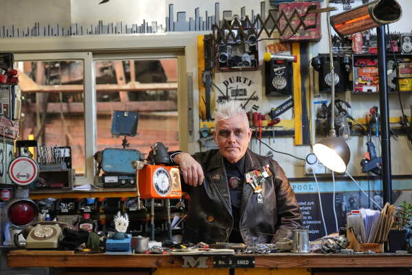 Artist Martin Horspool poses in his store at the Victorian precinct in Ōamaru, New Zealand, Friday, May 29, 2026. (AP Photo/Charlotte Graham-McLay)