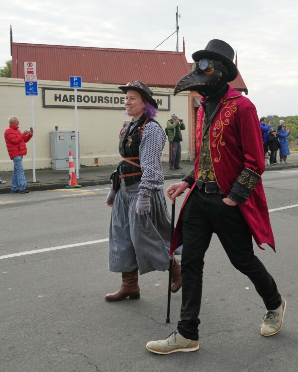 Participants march in a parade at the Steampunk NZ Festival in Ōamaru, New Zealand, on May 30, 2026. (AP Photo/Charlotte Graham-McLay)