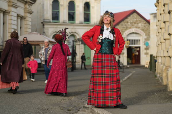 Steampunk NZ Festival co-founder Helen Jansen poses for a portrai at the annual event in Ōamaru, New Zealand, Saturday, May 30, 2026. (AP Photo/Charlotte Graham-McLay)