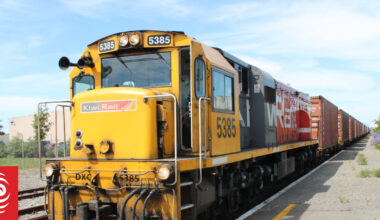 Thousand tonne freight train and passenger trip nearly collide at stop sign