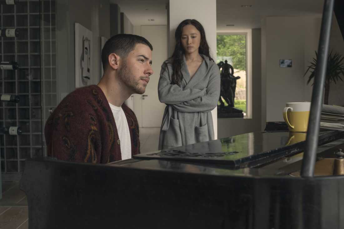 Nick Jonas as popstar Danny Wilson and Havana Rose Liu as his girlfriend Marcia in Power Ballad.