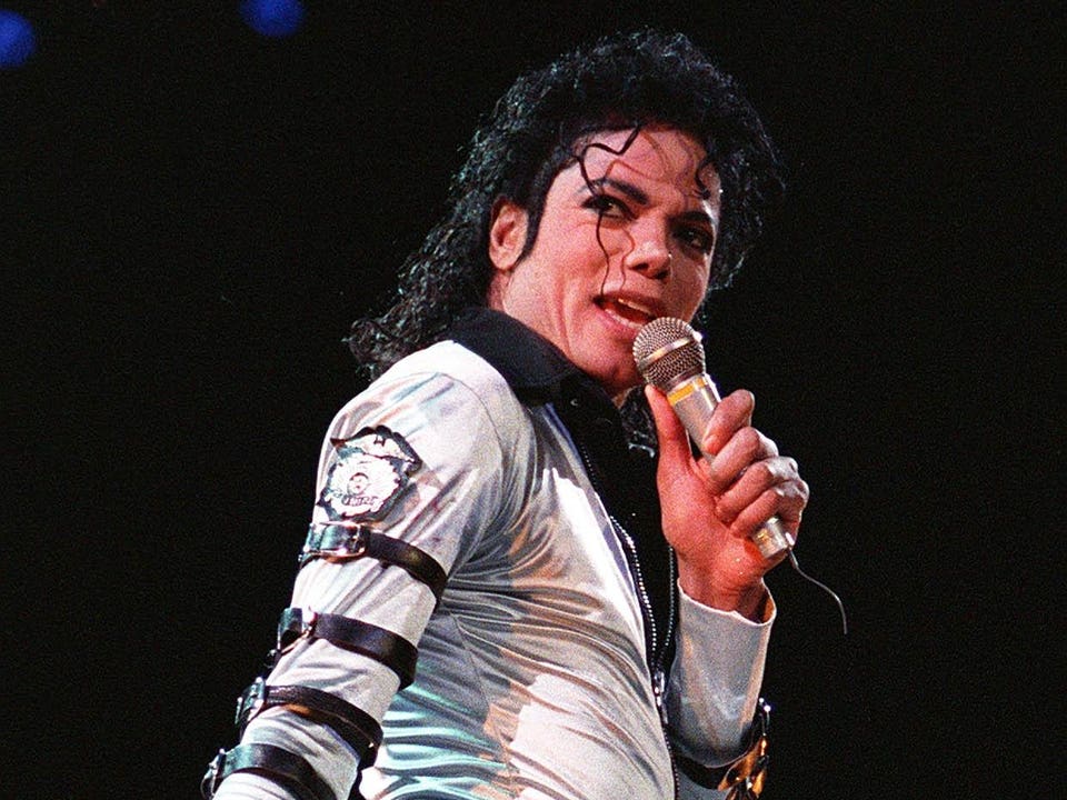 American pop music star Michael Jackson sings 13 O
