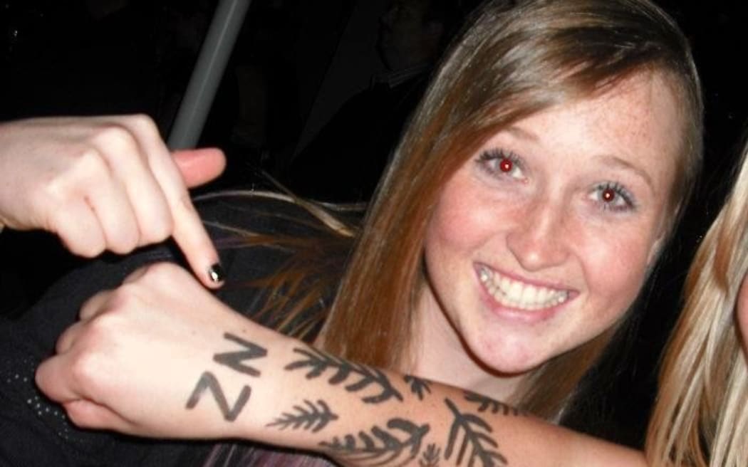 Erica Hume celebrates an All Blacks game in 2013, one year before she died by suicide at Palmerston North Hospital aged 21.