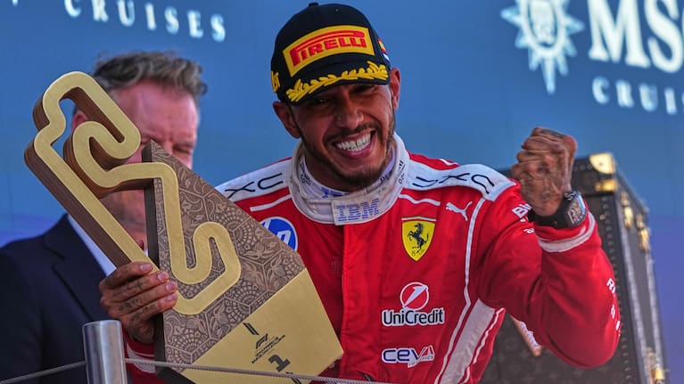 Ferrari driver Lewis Hamilton of Britain celebrates after wining the Spain F1 Grand Prix race at the Barcelona Catalunya racetrack in Montmelo, near Barcelona, Spain.