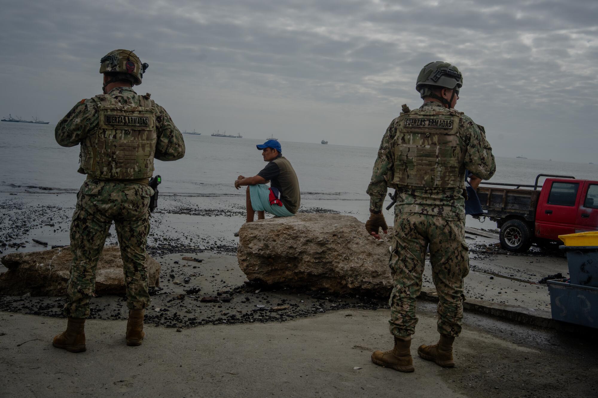Military personnel patrol Playita Mia