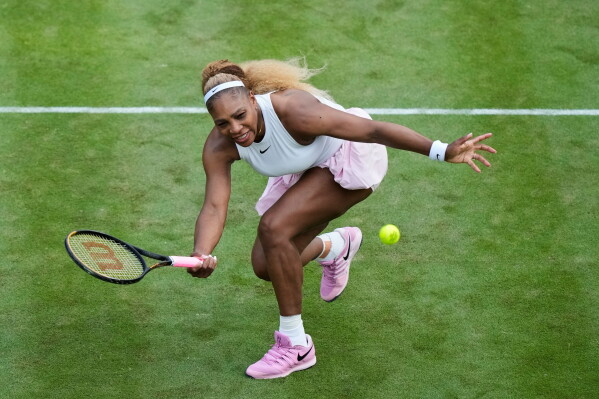 Serena Williams of the U.S. returns the ball as she and Czech Republic's Karolina Muchova play during their round of 16 doubles match against New Zealand's Erin Routliffe and Mexico's Giuliana Olmo during the WTA 500 Berlin Open tennis tournament at Steffi Graf Stadium, in Berlin, Germany, Tuesday, June 16, 2026. (AP Photo/Ebrahim Noroozi)