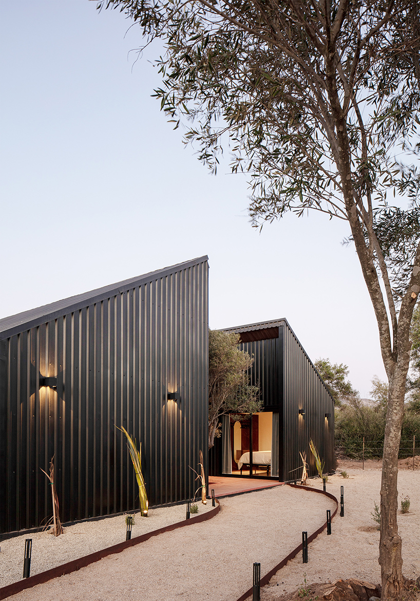 two corrugated metal volumes shelter courtyard retreat in mexico's desert landscape - 5