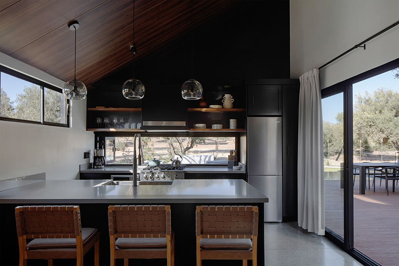 two corrugated metal volumes shelter courtyard retreat in mexico's desert landscape - 8