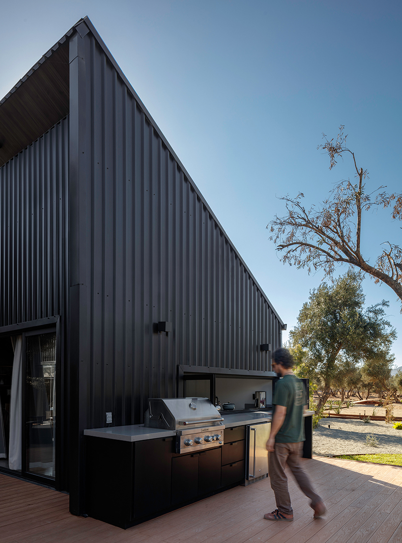 two corrugated metal volumes shelter courtyard retreat in mexico's desert landscape - 6