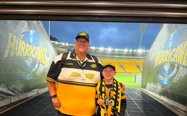 Andrew (L) and Connor Grant in the tunnel the Hurricanes run out from before the game.