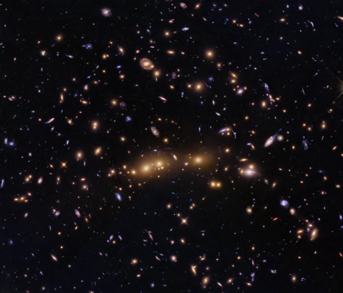 Hubble Glimpses Merging Galaxy Clusters