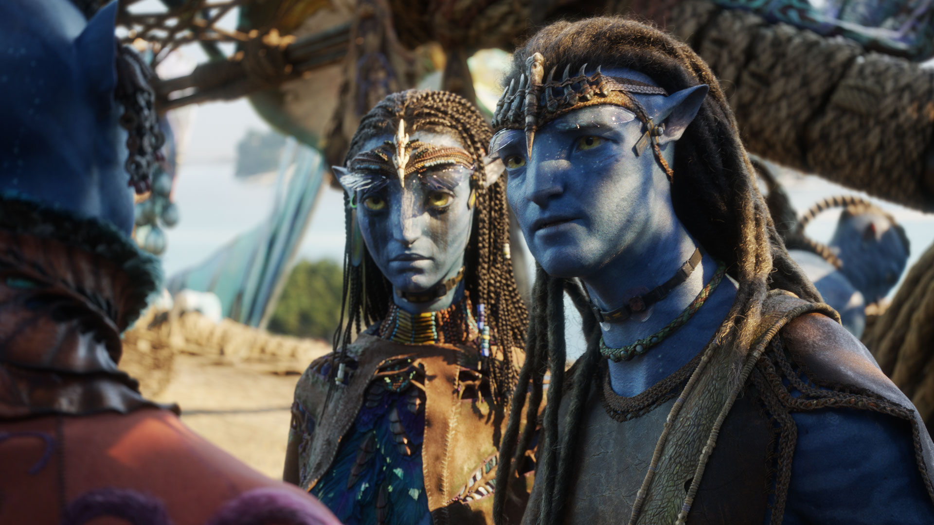 Jake Sully (played by Sam Worthington) and Neytiri (played by Zoe Saldaña) in a scene from Avatar: Fire and Ash.