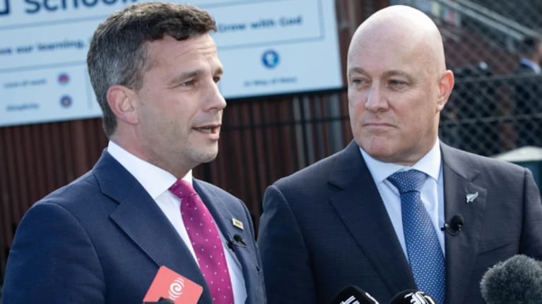 David Seymour (left) wants out of the Paris climate accord, but Christopher Luxon (right), disagrees. (File photo) Photo: RNZ / Angus Dreaver