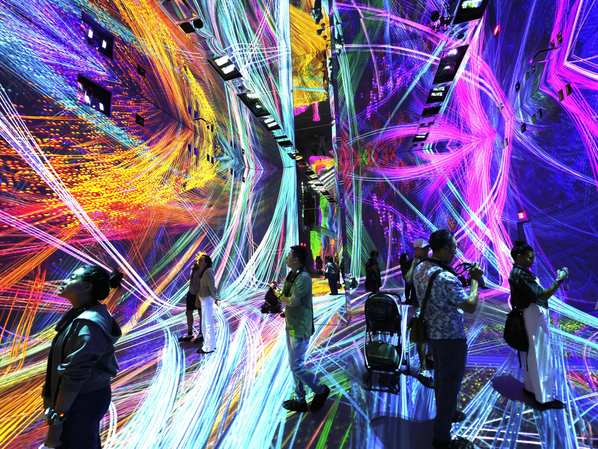 Visitors are immersed in streaks of color
