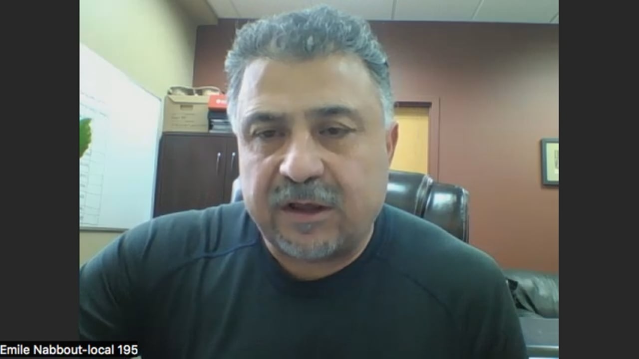 A union leader being interviewed via Zoom.