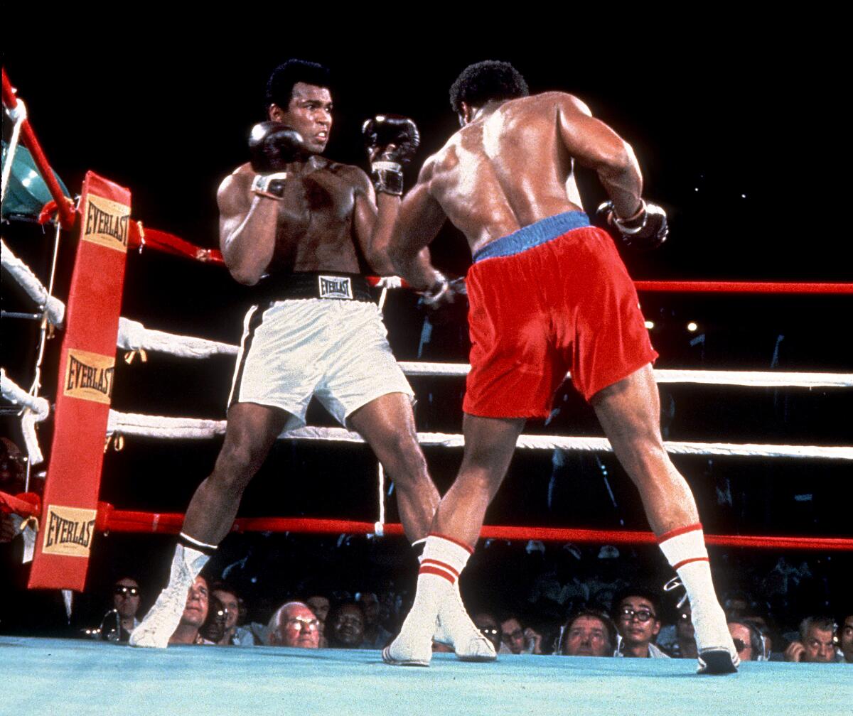 Two boxers face off in a classic fight.
