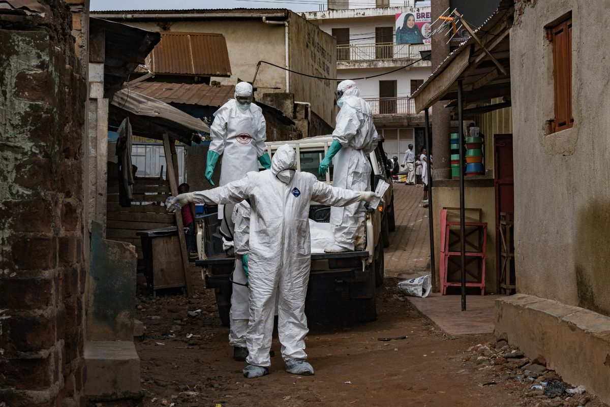 Uganda Red Cross worker sprayed with disinfectant