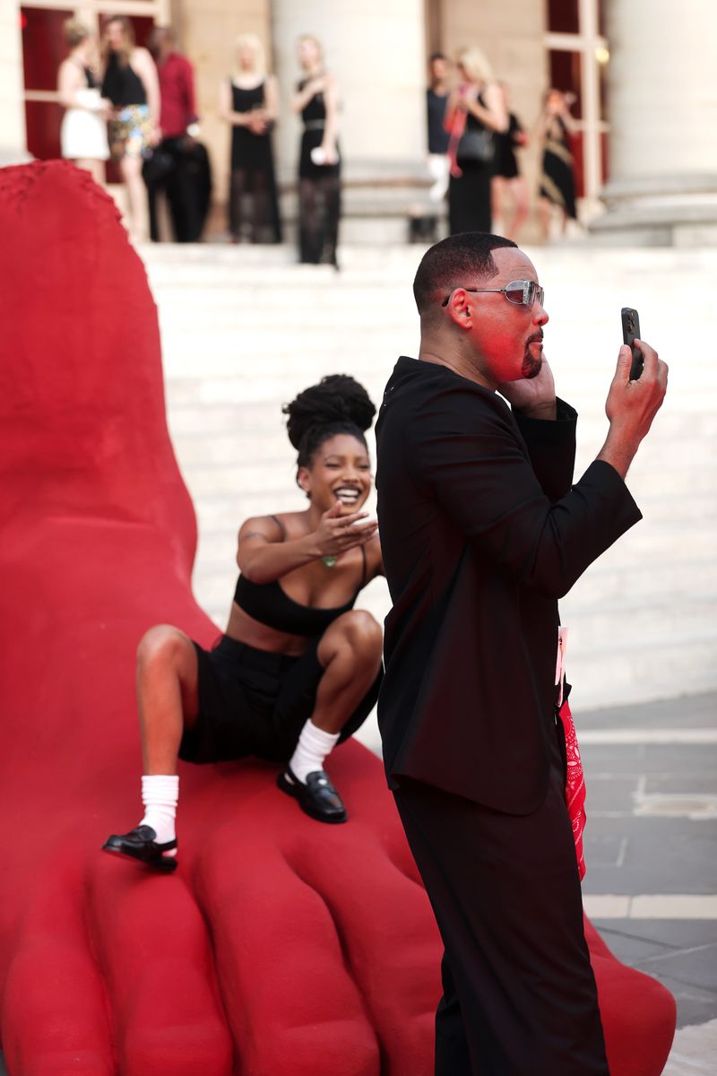 Willow Smith embraces her signature edgy style alongside brother Trey Smith during Christian Louboutin's Spring/Summer 2027 presentation in Paris.