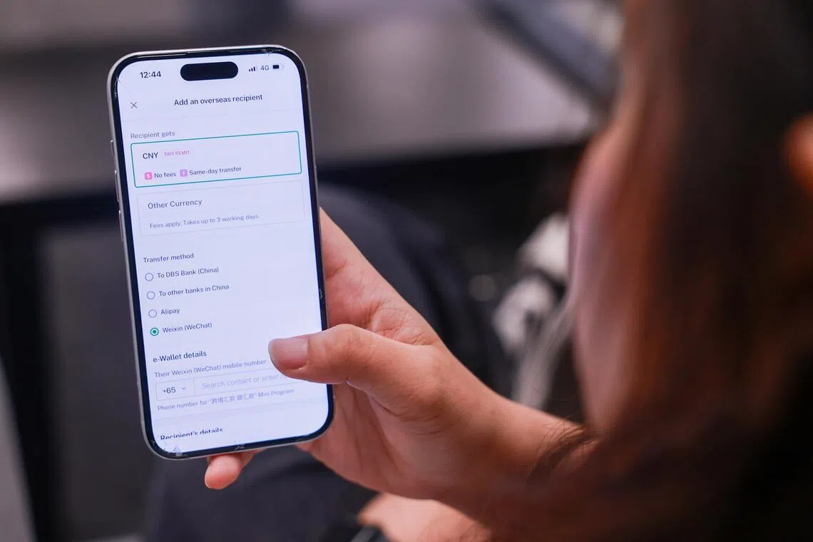 DBS Bank's new feature allows non-Chinese users to remit funds directly from their bank account to their WeChat Pay e-wallet - allowing them to pay without incurring additional fees.