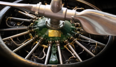 Detailed view of a vintage aircraft propeller engine in a Berlin museum.