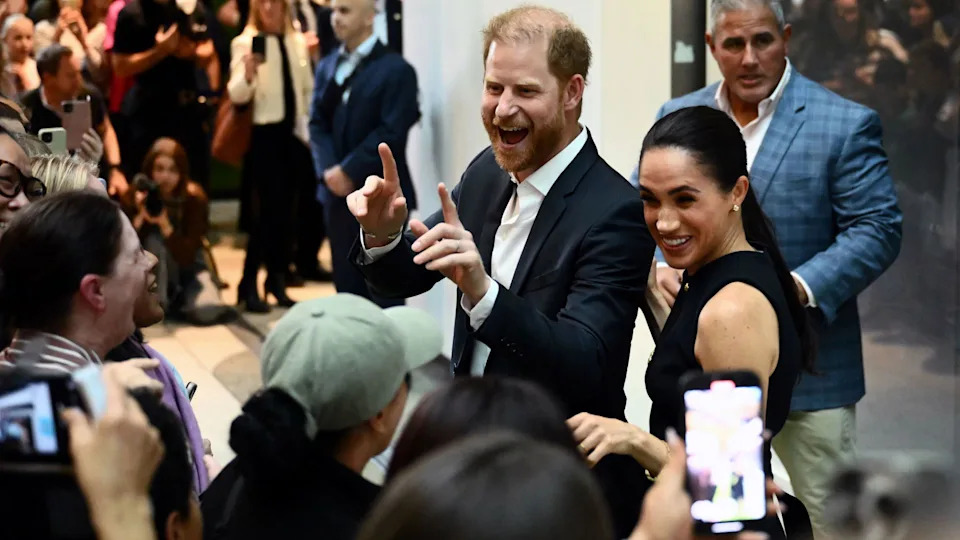 Prince Harry and Meghan Markle pose for pictures at Royal Children's Hospital Melbourne, April 14 