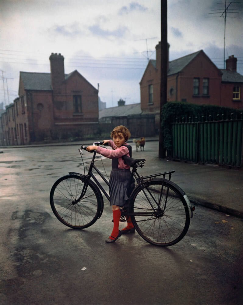 Girl on bike.