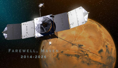 An illustration of a spacecraft with solar panels floating in front of a red planet