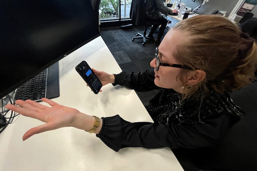 Young lady with looks frustrated with phone